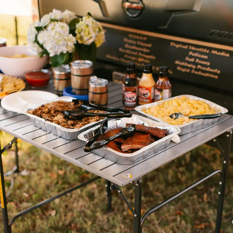 Portable Staging Slim-Fold Table - Choice 196 - Slim-Fold Outdoor Cook Station with Storage Shelves Detail